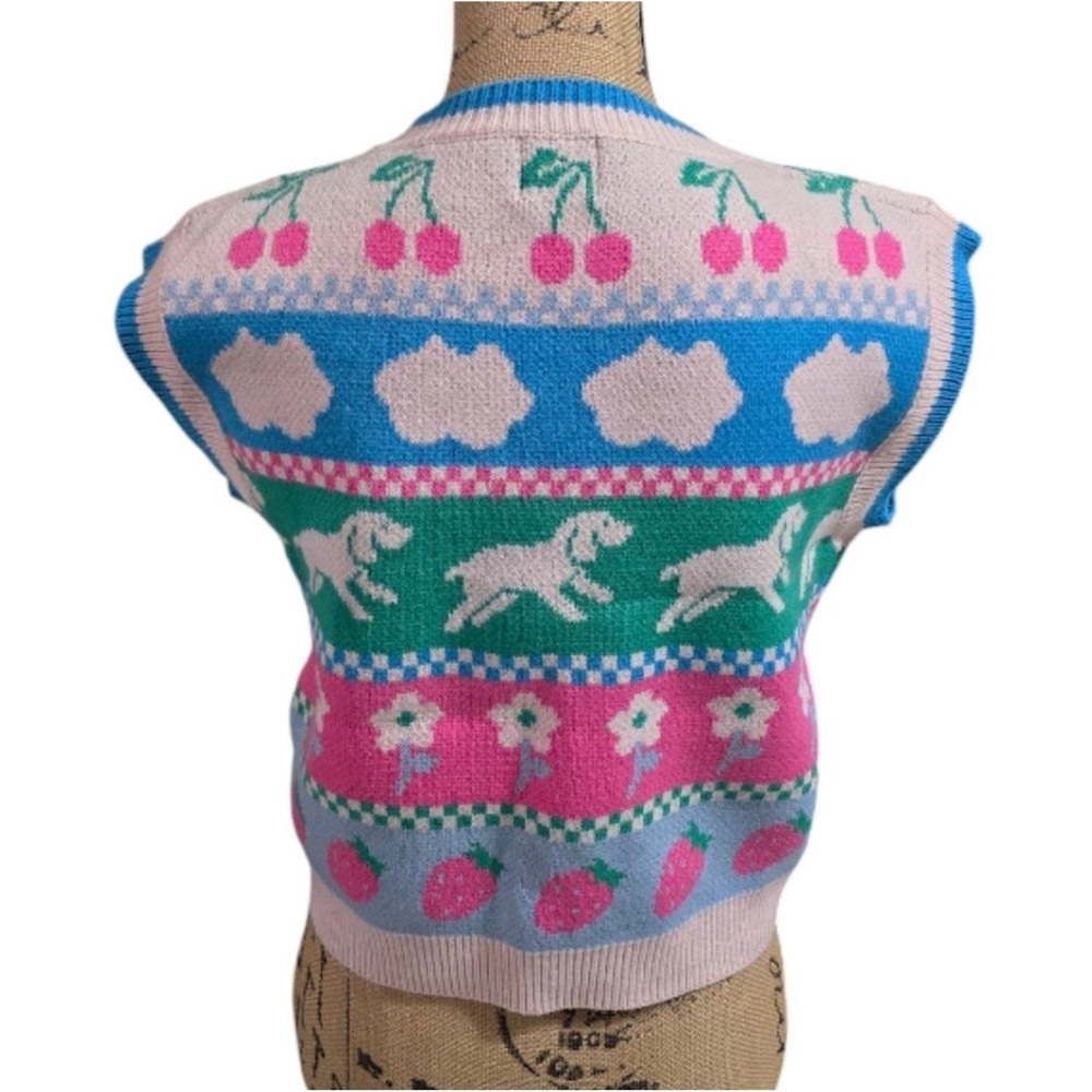 Whimsical Pink and Blue Crew Neck Sweater with Playful Patterns